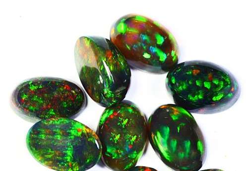 2.44ct. Oval Cab cut 6.00x 4.00 mm Multi Color Play Black Opals