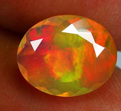 1.45ct Rainbow Untreated Welo Fire Opal IF, Faceted 10.00 x 8.00mm