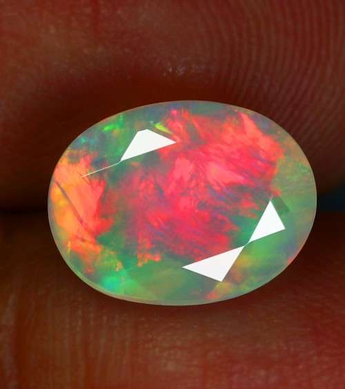 1.70ct.Rainbow Fire Opal plesant Oval  Faceted Cut 10x8 mm
