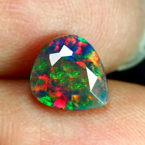 0.95 ct . Black Fire Opal Pear Faceted cut 8.00 x 7.00mm