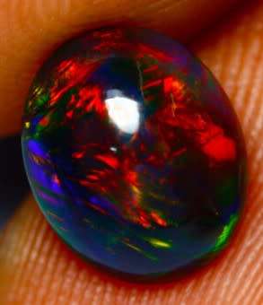 2.03 ct Grand Black Fire Opal , Cabochon cut 11.00 x  9.00 mm