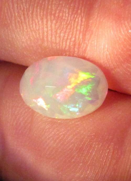 1.55Ct. IF 12 x 8 mm Rainbow Fire Opal