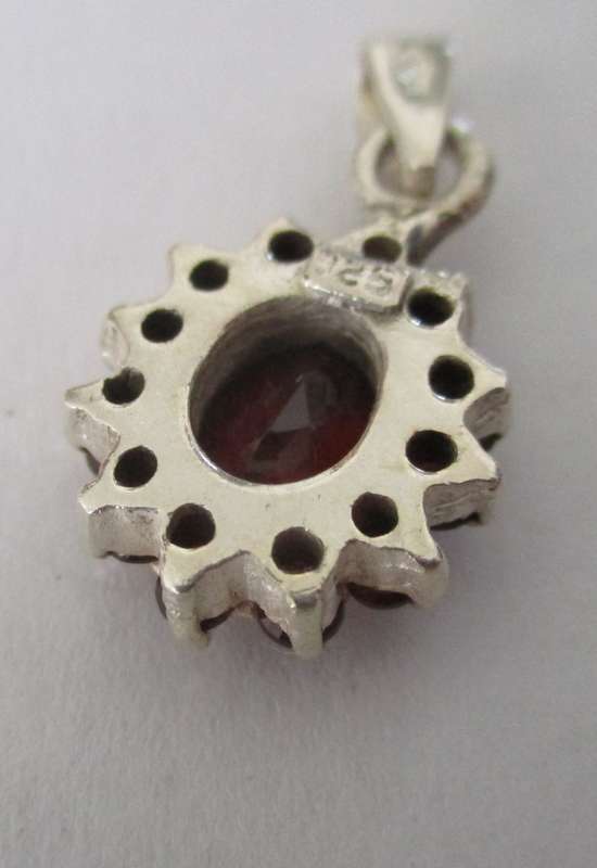 Sterling Silver and Genuine Garnets Pendant