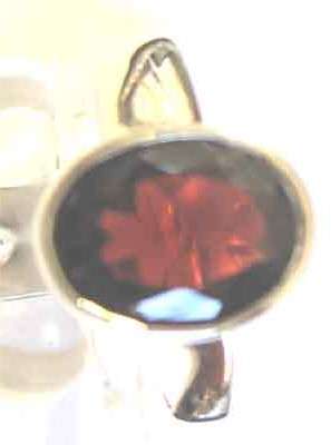 Solitaire , Sterling Silver and  Genuine Garnet  Ring.