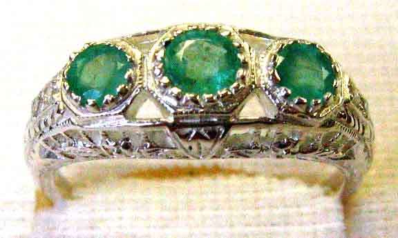 Genuine Sterling Silver, Emeralds  and Diamonds Ring.