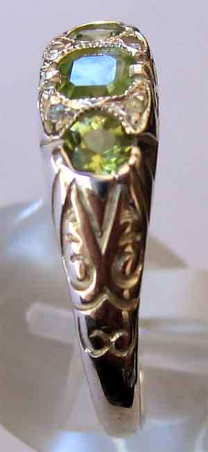 Genuine Sterling Silver, Peridot and Diamonds Ring.