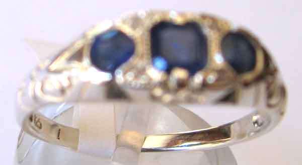 Genuine  Sapphires and Diamonds  Ring in Sterling Silver.