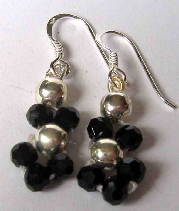 A pair of Sterling Silver and  Black Spinel   Earrings.