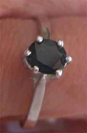 Solitaire, Sterling Silver and Blue Sapphire Ring.