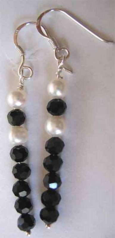 A pair of  Beautiful Sterling Silver, Black Onyx and Cultured Pearls Earrings.