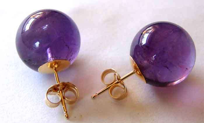Solid   14 karat Gold and Amethysts Studs/ Earrings