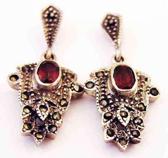 A pair of Sterling Silver , Marcasite and Genuine Garnets Earrings