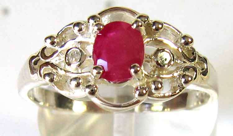 Stylish Sterling Silver , Genuine Ruby and Diamond Ring.