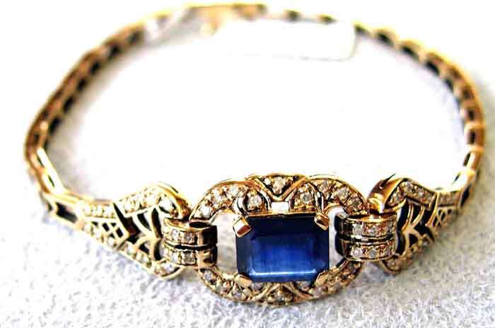 Gorgeous 9k Gold and Genuine Blue Sapphires and Diamonds Bracelet- chain .
