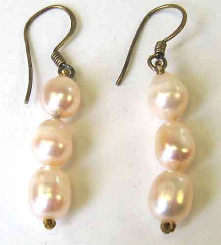 A pair of Sterling Silver and " Biwa' " Pearls Earrings.