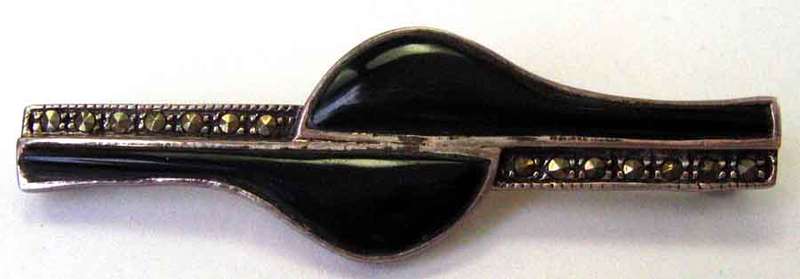 925 Sterling Silver, Marcasite and Black Onyx Brooch.