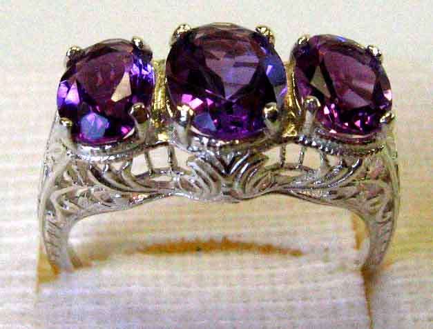 Genuine - Quality Amethysts in Sterling Silver Ring.