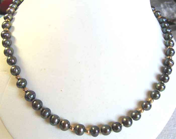 Lovely genuine Black Pearls and 14 k Gold clasp and beads Necklace.