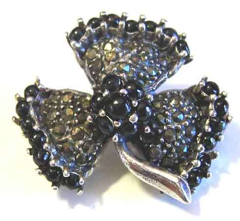 925 Sterling Silver, Marcasite  and Black Onyx ` Flower ` Brooch .