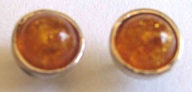 Cute, A pair of Sterling Silver and Amber Stud Earrings.