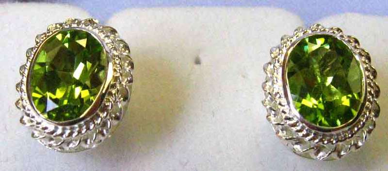 A pair of Sterling Silver and Genuine Peridots Earrings