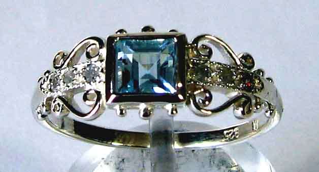 Blue Sapphire and Diamond Ring.