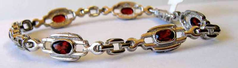 Pretty Sterling Silver and Genuine Garnets Bracelet.