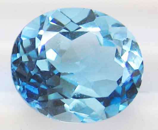 Huge, 14.00 x 10.00 mm Oval Faceted cut Blue Topaz 7.09 ct.