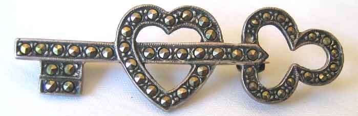 925 Sterling Silver  and  Marcasite  Brooch.
