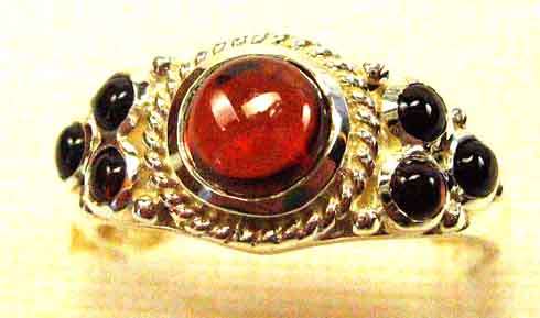 Lovely design- Sterling Silver and Genuine Garnets Ring