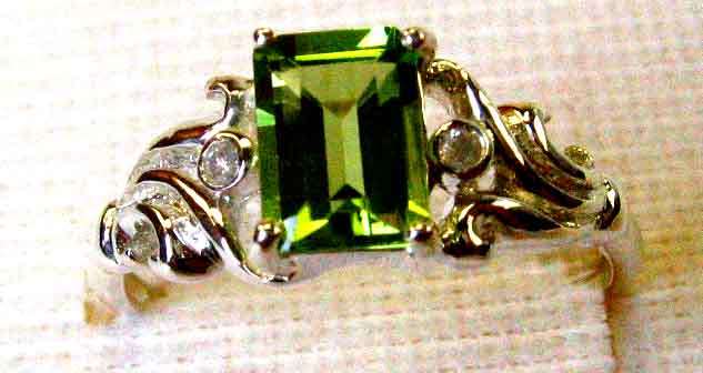 Sterling Silver Genuine Peridot and Diamonds Ring