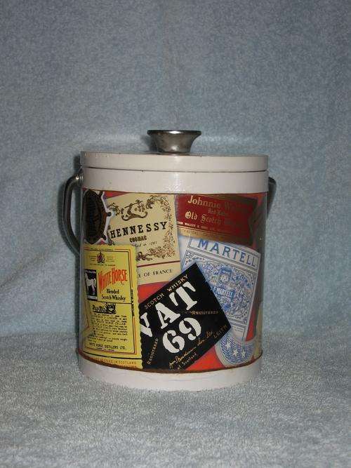 Beautiful Ice Bucket with details of various whiskey's etc. - BID TODAY & DON'T DELAY