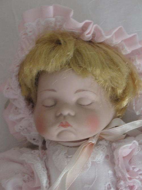 Shh! Don't wake sleeping beauty! Porcelain doll with rosy cheeks & beautiful mouth - perfect baby!