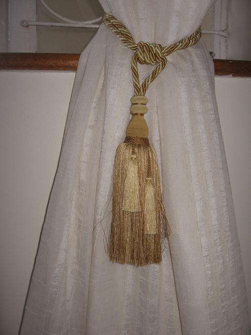 A pair of Beautiful Gold, Cream and Bronze curtain tiebacks