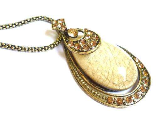 Elegant antique necklace with a cream two tone opal bead & bronze diamantes in an organza gift pouch