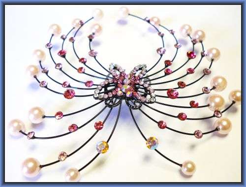 Totally irresistible hair slide with a twist of Pearl beads & Diamantes