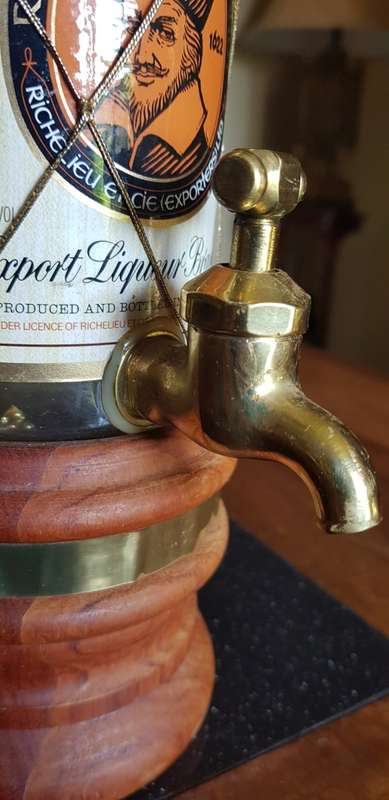 Richelieu Bottle on Tap with Wooden Features and  a Brass Tap
