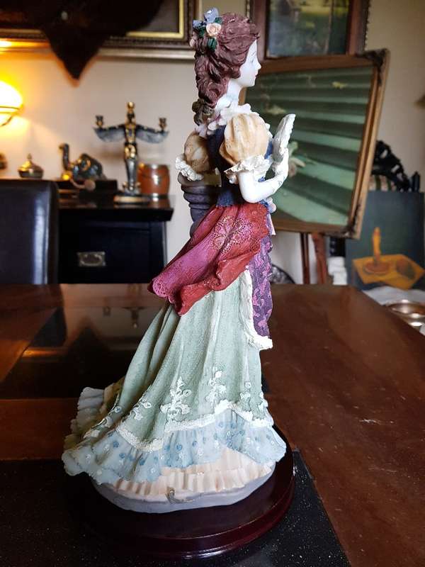 Beautiful porcelain/Resing Doll. 32 cm Tall