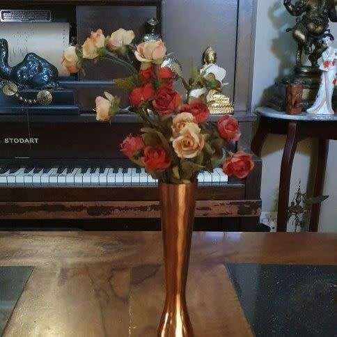 *Stunning Copper Vase With Synthetic Flower arrangement.*