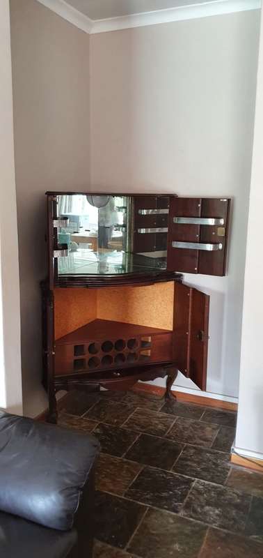 Ball and Claw Liquor Cabinet