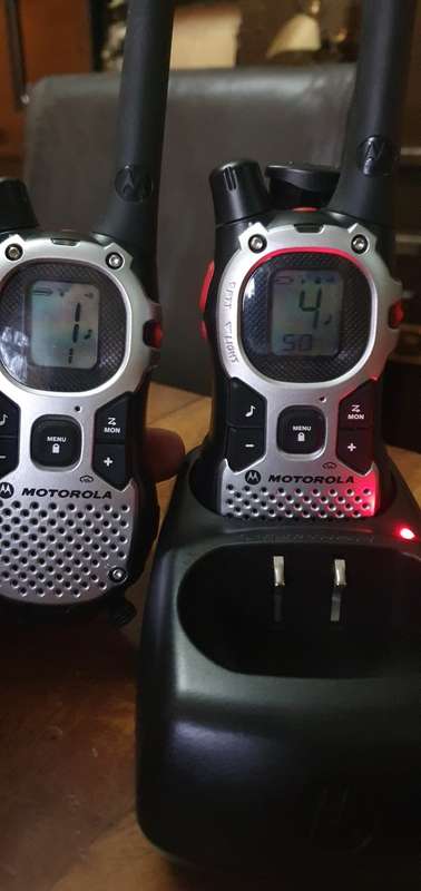 3 x Motorola Two Way Radios plus Charger Unit.