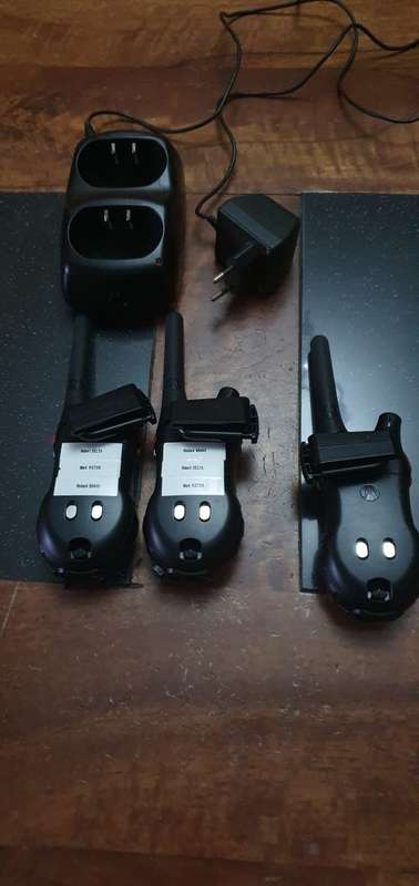 3 x Motorola Two Way Radios plus Charger Unit.
