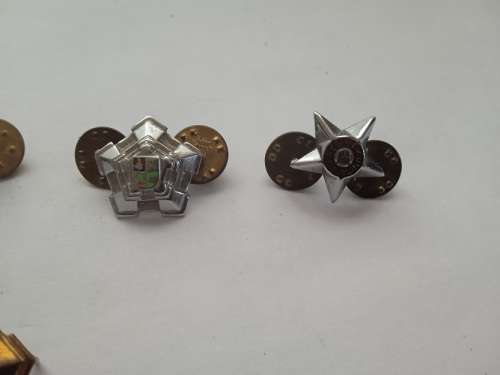 Ex Unitate Vires badges