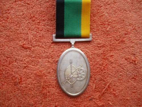 MK MEDAL IN SILVER - NUMBERED 206 - FOR DEVOTION TO DUTY