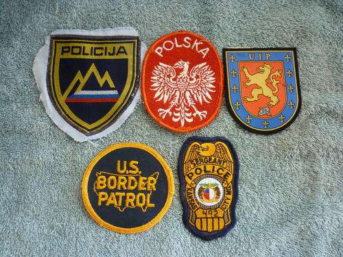 POLICE PATCHES , POLAND,KANSAS CITY, SPAIN,US BORDER PATROL & SLOVENIA