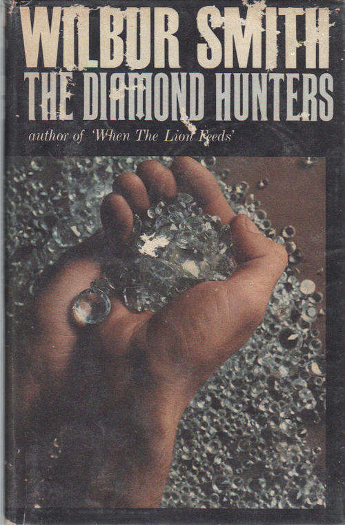 THE DIAMOND HUNTERS - Wilbur Smith - HARD COVER FIRST EDITION