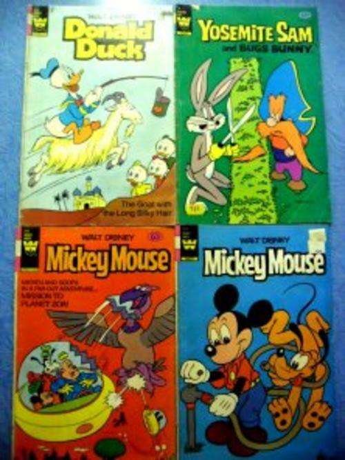 4 X WALT DISNEY COMICS - In Good Condition - See thumbnail!