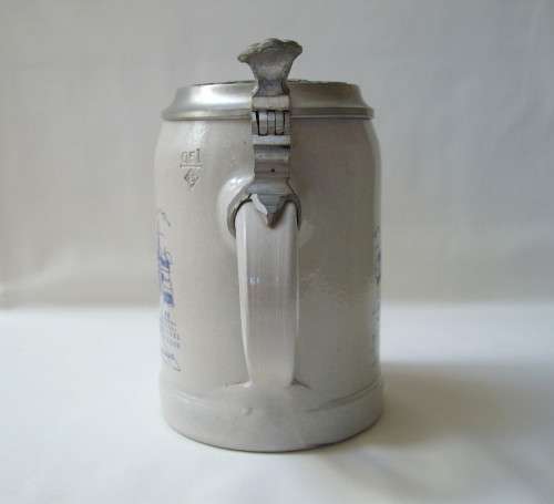 VINTAGE GERMAN STONEWARE 'GRUSS AUS DEM LOWENBRAU-LAND' BEER TANKARD