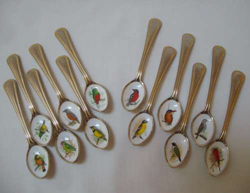 SET OF TWELVE VINTAGE GOLD-PLATED STAINLESS STEEL & ENAMEL TEASPOONS OF SOUTH AFRICAN BIRDS