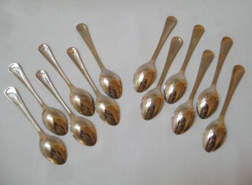 SET OF TWELVE VINTAGE GOLD-PLATED STAINLESS STEEL & ENAMEL TEASPOONS OF SOUTH AFRICAN BIRDS